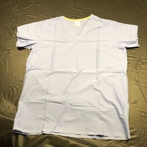 Previously Worn Ladies Standardtextile Scrub Top. Size medium.